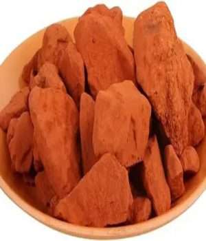 A natural earth pigment that ranges in color from yellow to deep orange or brown.
