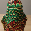 "Handmade traditional Indian mitti kothi made of clay and dung, used for storing rice, dal, and wheat in a rural household.