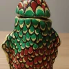 "Handmade traditional Indian mitti kothi made of clay and dung, used for storing rice, dal, and wheat in a rural household.