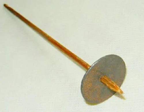 Wooden supported spindles with clay whorls, used for hand-spinning cotton fibers into yarn. Apan Mithila Todayuse Mithilause Mithila use
